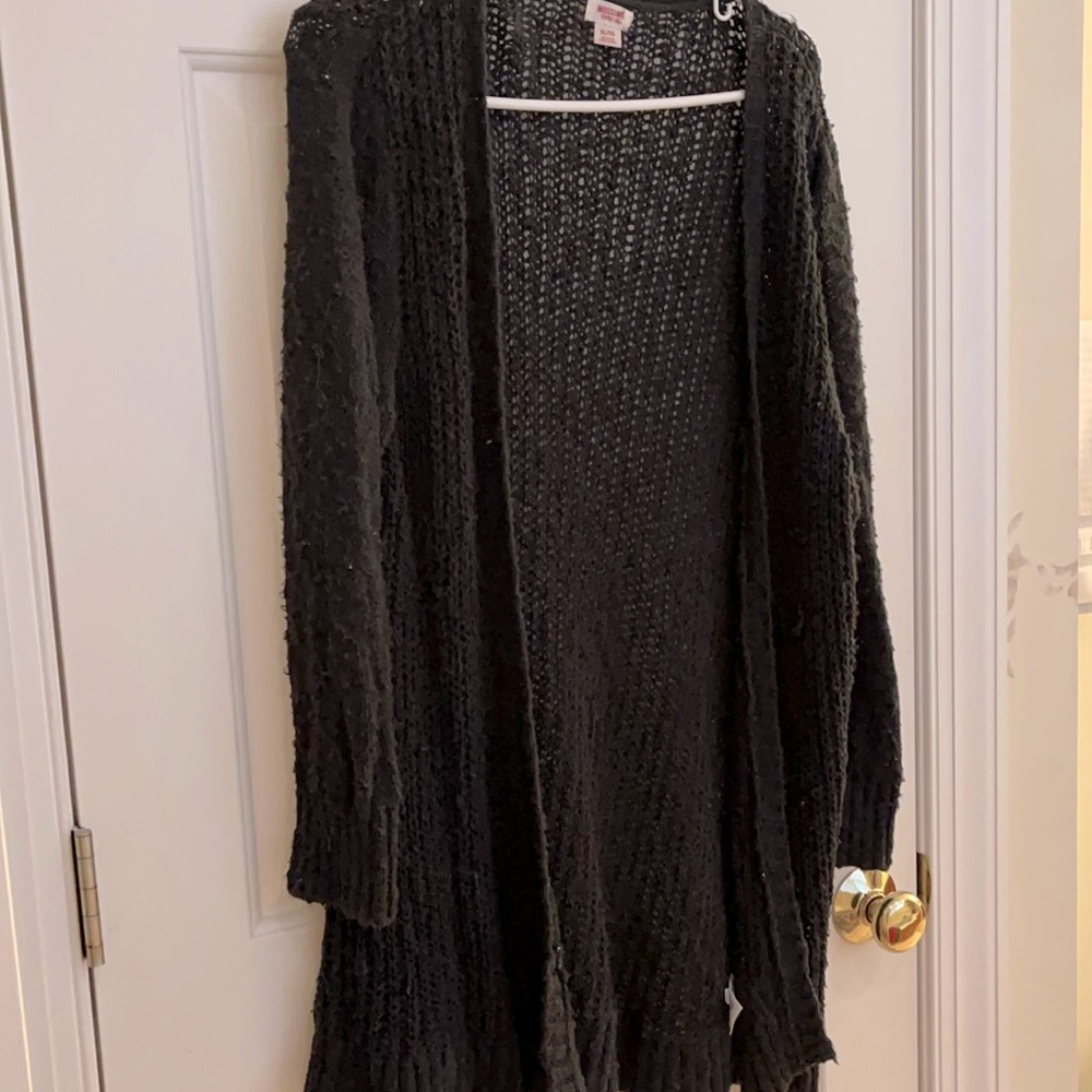 Long and breezy. Very comfortable. Never worn.
